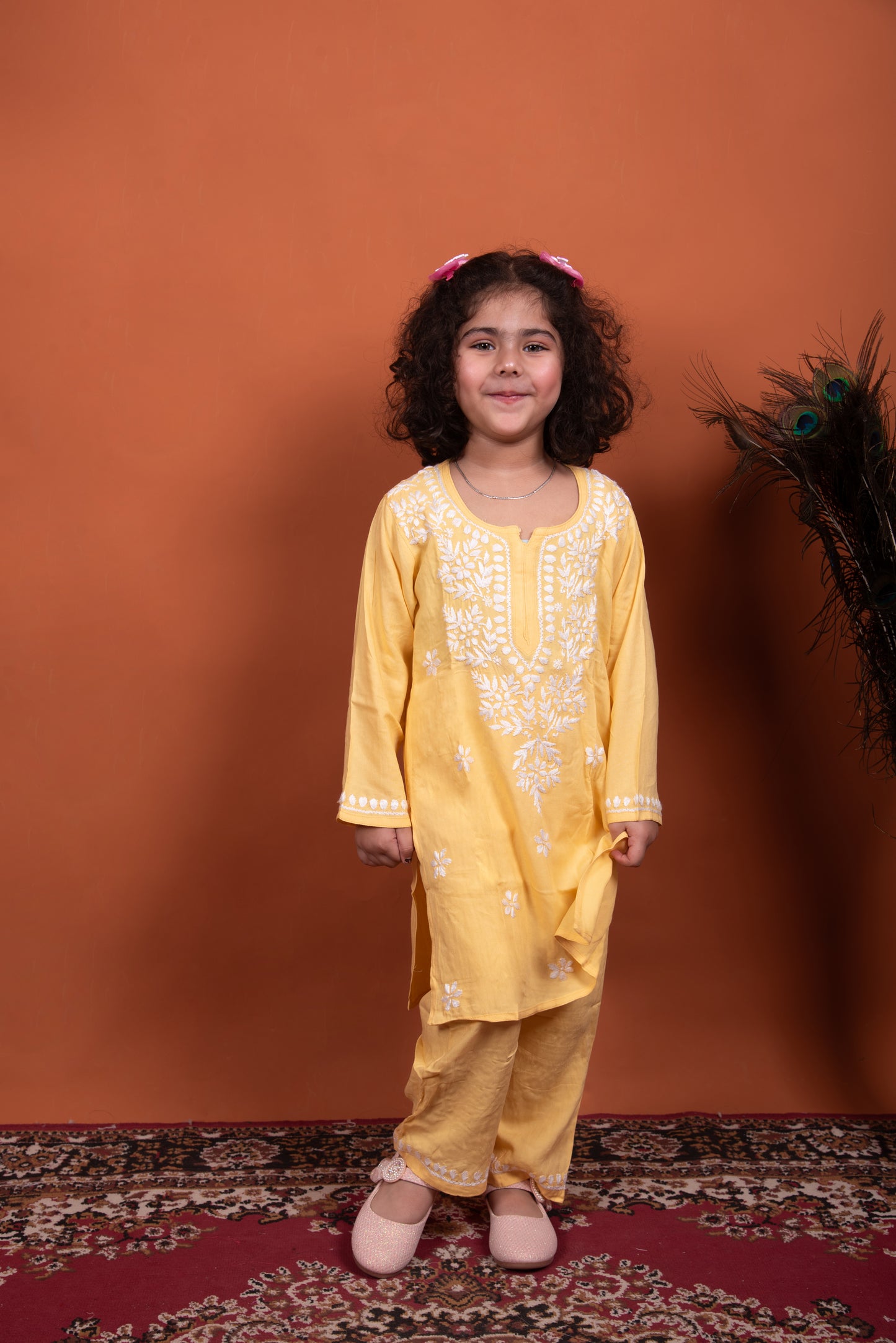 yellow chikankari kidswear dress