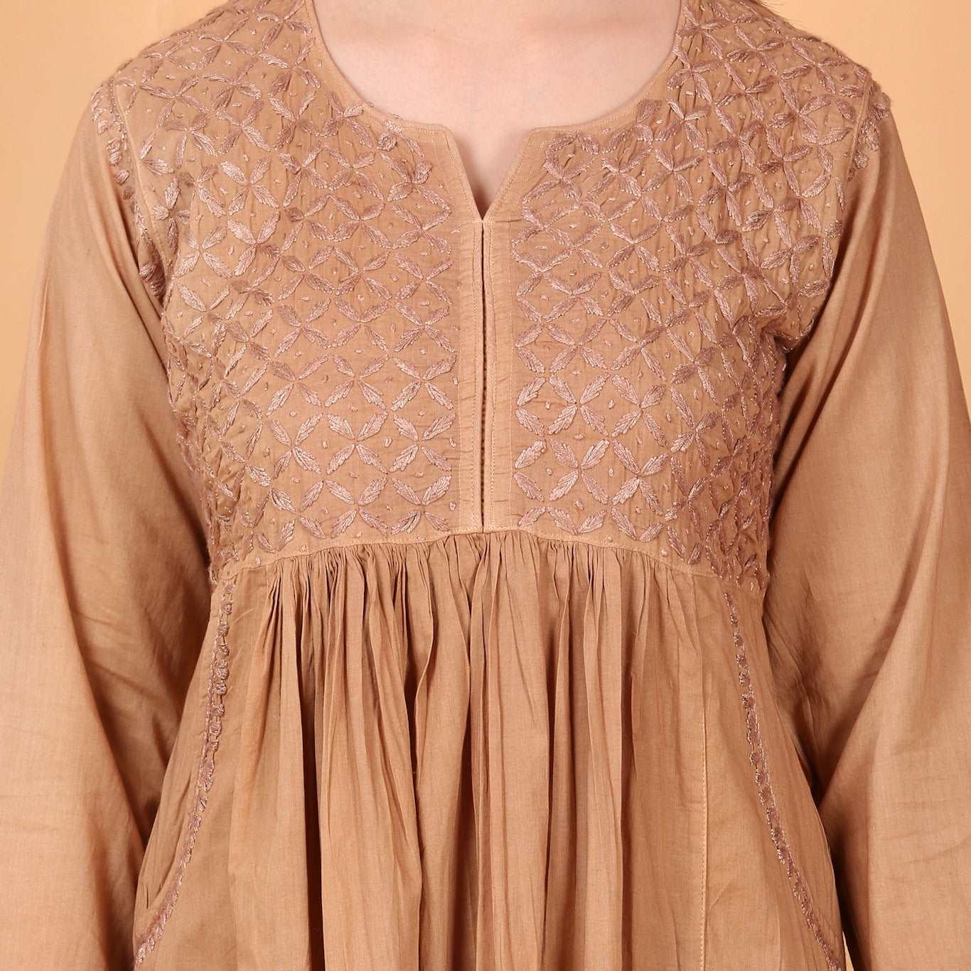 Haniya Chiknkari mulmul pocket style gown(Caramel Brown)