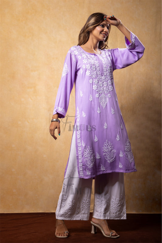 Woman wearing a purple embroidered kurta with white pants in chikankari embroidery